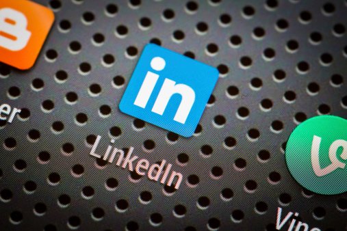 BELCHATOW, POLAND - APRIL 10, 2014: Closeup photo of Linkedin icon on mobile phone screen. Popular social network.