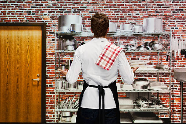istock Rear view of chef in kitchen 503218020