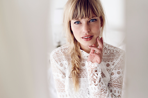 Portrait of young lady in lace top