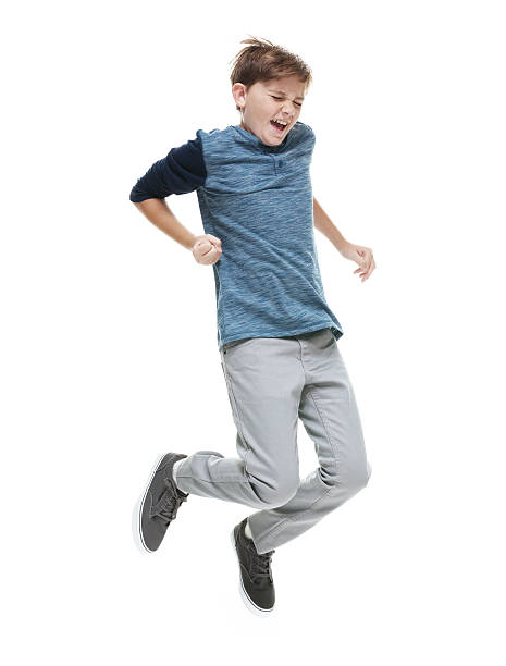 istock Excited little boy cheering and jumping 503220526
