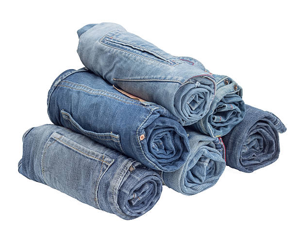 istock Lot of different blue jeans on white 503220773