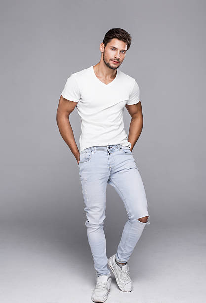 istock Sexy handsome man in white t-shirt looking at camera 503221004