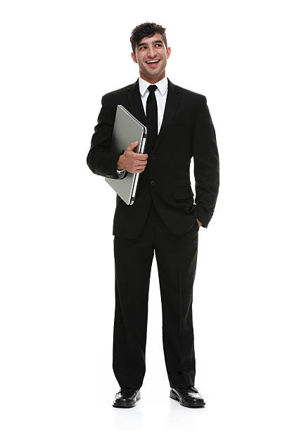 istock Smiling businessman holding laptop 503221472