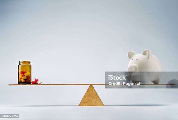 Medical Costs Or Insurance Fund Concept Stock Photo - Download Image Now - Currency, Capsule - Medicine, Healthcare And Medicine