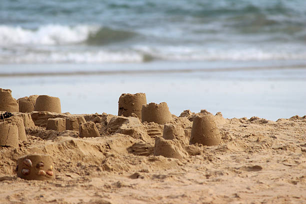 istock Image of sandcastles on beach, sand-castles made on seaside holiday 503222955