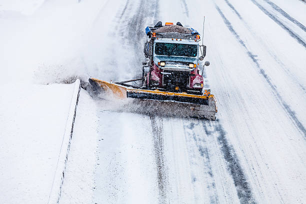 istock Snowplow removing Snow from the Highway during a Snowstorm 503223155
