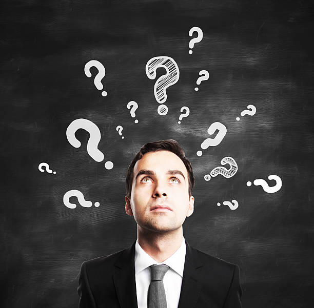 istock businessman with questions marks 503224448