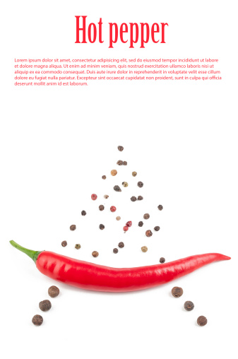 Dry chili peppers, chili powder and mortar and pestle on white background.