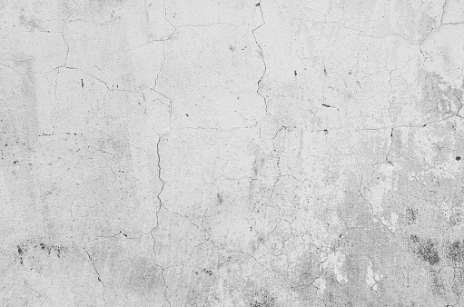 Gray white grunge cracked old wall texture, concrete cement background