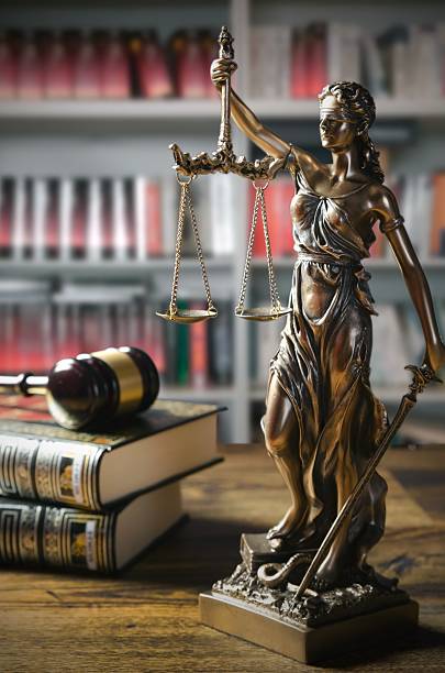 istock Themis and gavel in court library 503226024