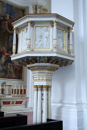 Heidelberg, Germany - August 2, 2007: The pulpit of the Jesuit Church (Jesuitenkirche) in Heidelberg, built from 1712 to 1759 in the Baroque style, it is one of the largest churches in the historic city.