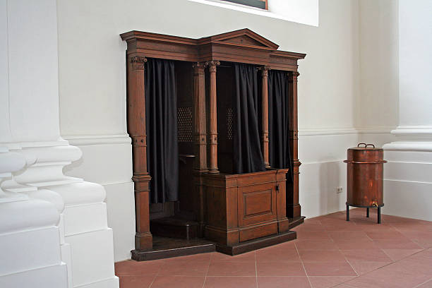 Heidelberg, Germany - August 2, 2007: The confessional booth of the Jesuit Church (Jesuitenkirche) in Heidelberg, built from 1712 to 1759 in the Baroque style, it is one of the largest churches in the historic city.