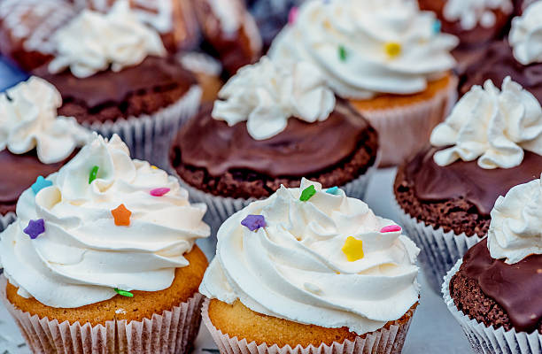 istock Cup cakes with wiped cream and little stars 503227970
