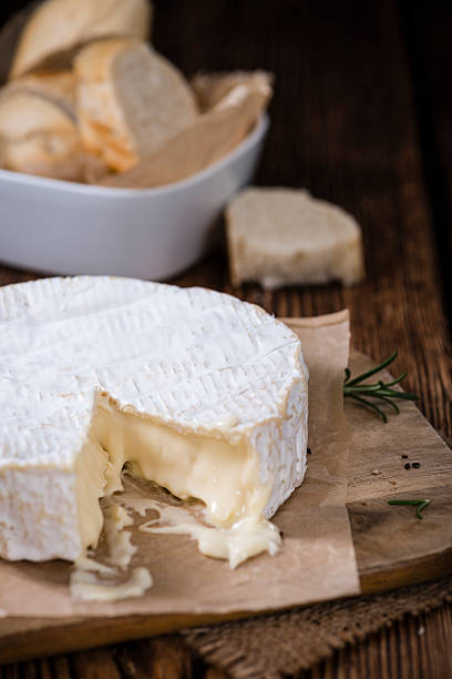 istock Creamy Camembert on wooden background 503228890