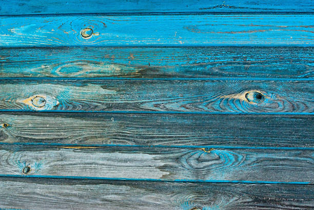 istock Old wooden fence painted in blue. 503229992