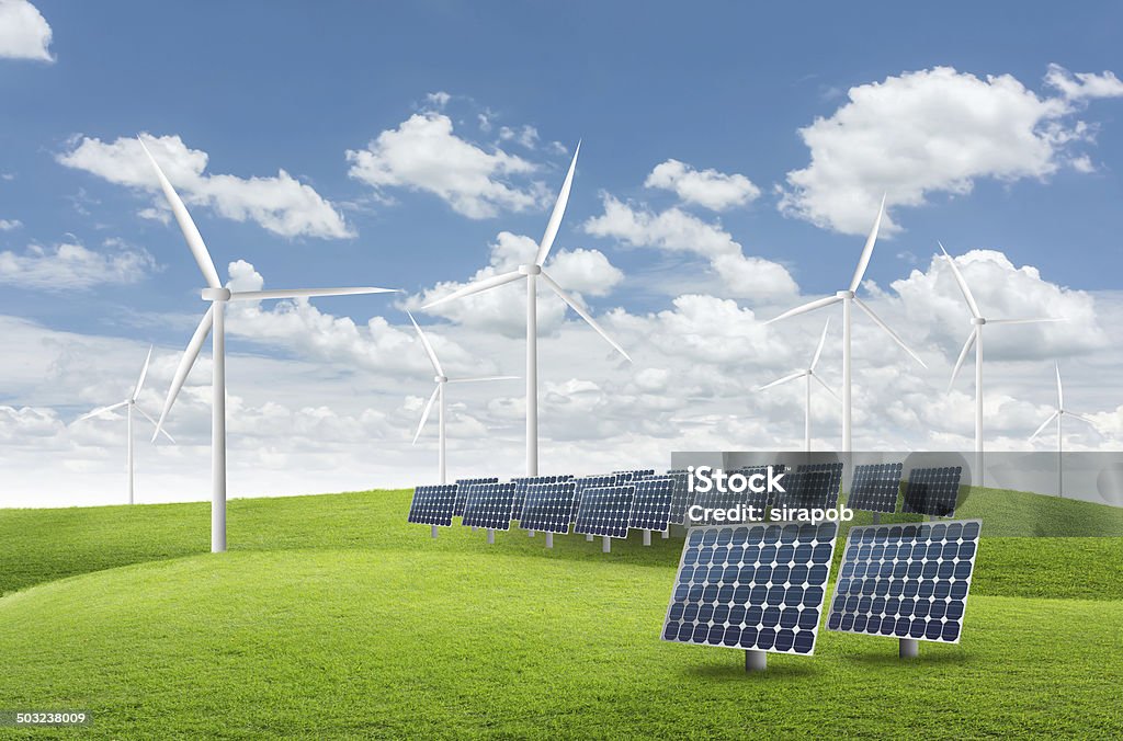 solar energy panels and wind turbine solar energy panels and wind turbine power Agricultural Field Stock Photo