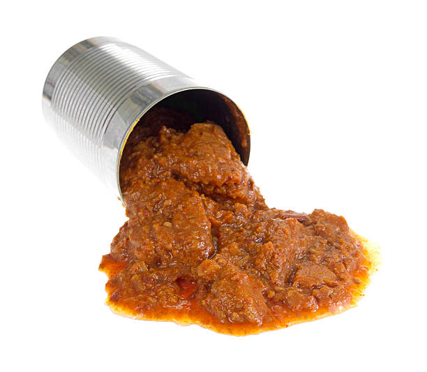 istock Opened can of hot dog chili spilling 503238323