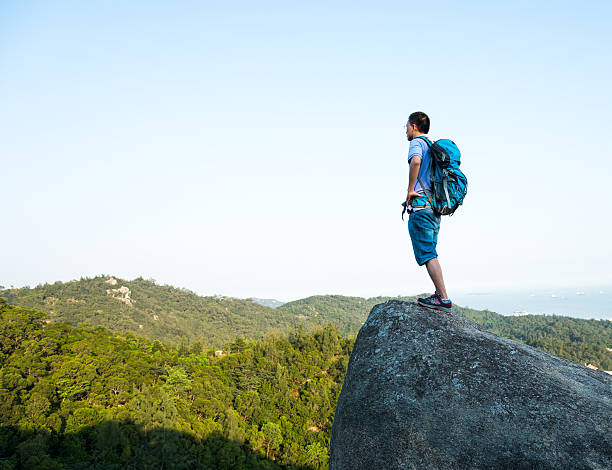 istock Hiking man on a rock 503240866