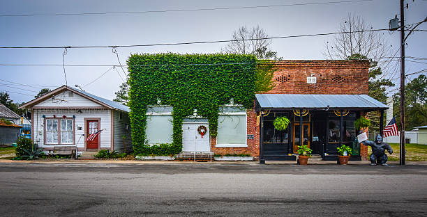 A row of shops in in the old-fashioned main street of Sopchoppy, Florida in cool winter light.