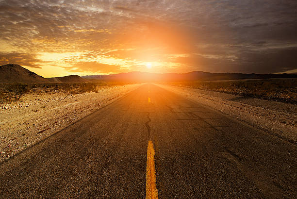 istock Sunset on Horizon of Desert Road 503241320