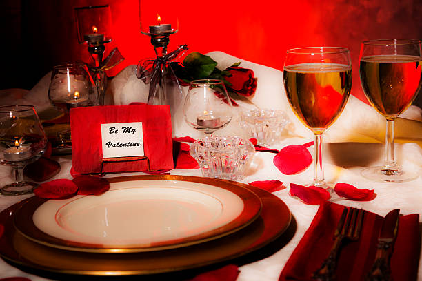 istock Valentine's Day dinner. Romantic table place setting. Card on plate. 503241466