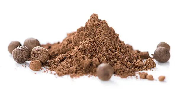 Heap of Allspice powder (isolated on white background)