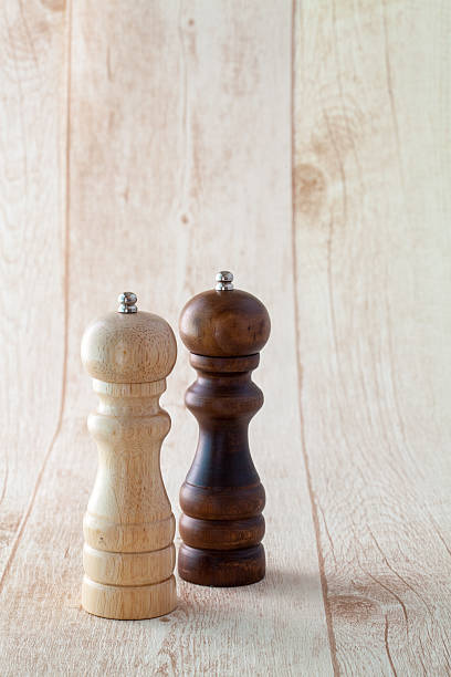 istock pepper grinder wood background 503242324