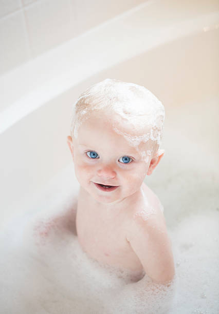 istock Baby boy enjoying a bubble bath 503242468