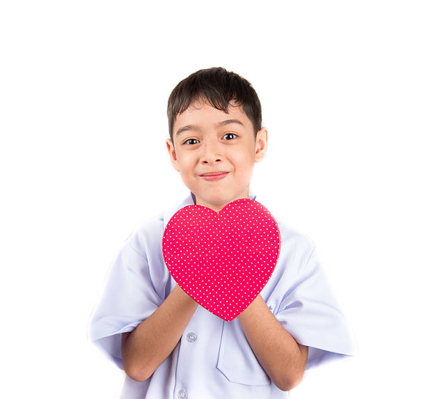 istock Little boy taking heart shape pretent as doctor 503243736