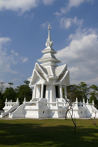architecture of white building in buddhist temple in Thailand