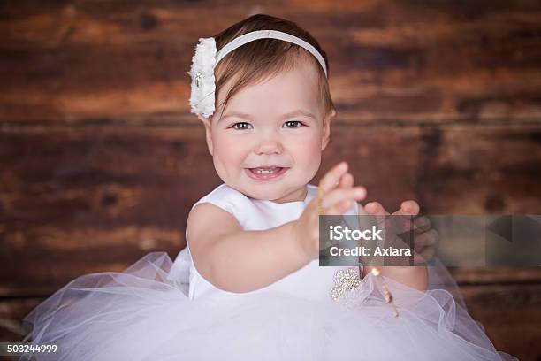 Baby Girl Wearing A White Dress Stock Photo - Download Image Now - Baptism, Child, Childhood