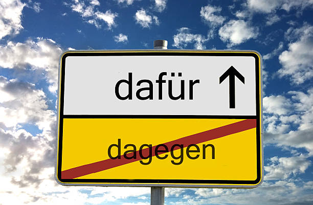 Town sign for it against Place sign for it against umfrage stock pictures, royalty-free photos & images