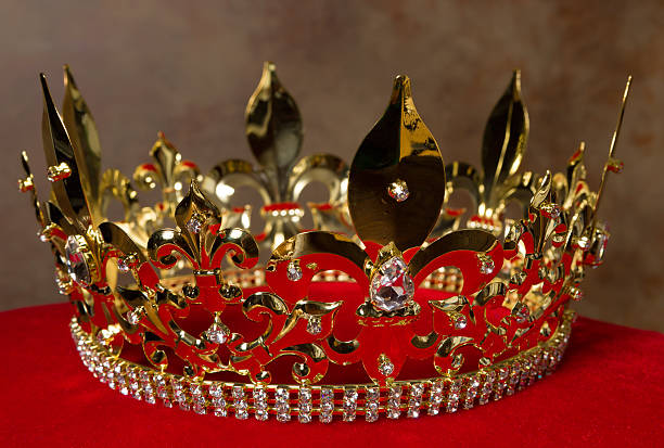 istock Golden crown on red velvet 503249816