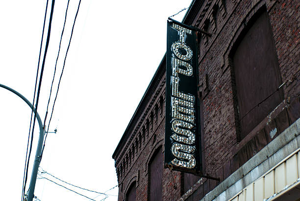istock Topless Dance Club Sign on Decayed Building 503250898