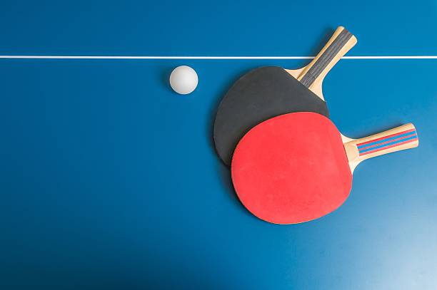 Ping pong or table tennis background with rackets stock photo