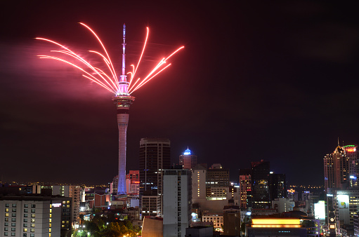 Auckland, New Zealand - December 31, 2015: Auckland Sky Tower displaying a spectacular firework display to celebrate 2016 New Year. New Zealand is one of the first countries to observe the New Year.