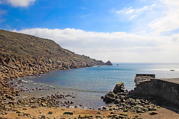 Breakwater beach and sea at Lamorna Cove Breakwater beach and sea at Beautiful Lamorna Cve south Cornwall England lamorna cove stock pictures, royalty-free photos & images