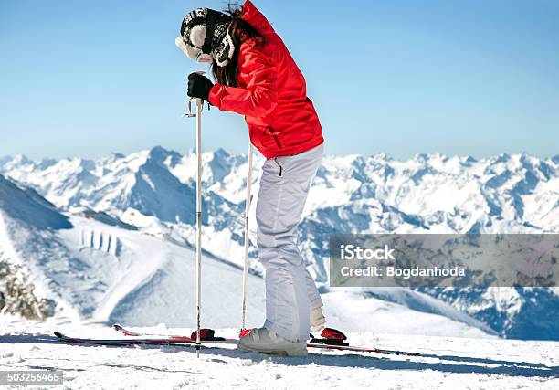 Female Skier On Ski Slope In European Alps Stock Photo - Download Image Now - Activity, Adult, Adventure