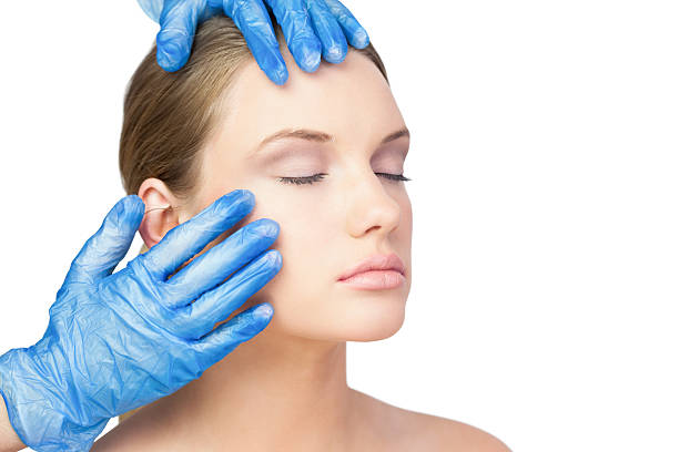 istock Surgeon examining peaceful young blonde 503259931