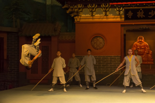 Dengfeng,Henan,China-October 21,2013:The young monks of Saolin temple perform Kung Fu show at Shaolin Temple in Dengfeng of Henan Province, China.The monastery is long famous for its association with Chinese martial arts and particularly with Shaolin Kung Fu, and it is the best known Mahayana Buddhist monastery to the Western world.