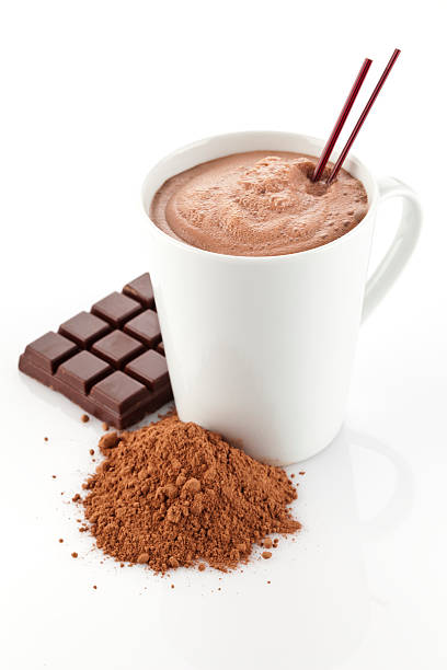 istock Hot chocolate mug with ground cocoa and candy bar 503262327