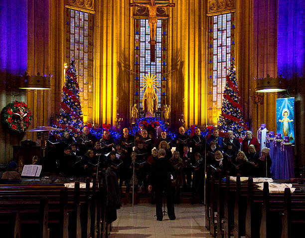 Istanbul, Turkey - December 14, 2013: Christians get ready for concert in St. Antoine Roman Catholic Church in Istanbul, Turkey. As you can see the singers are concentrated and singing there Christmas hymns with joy.