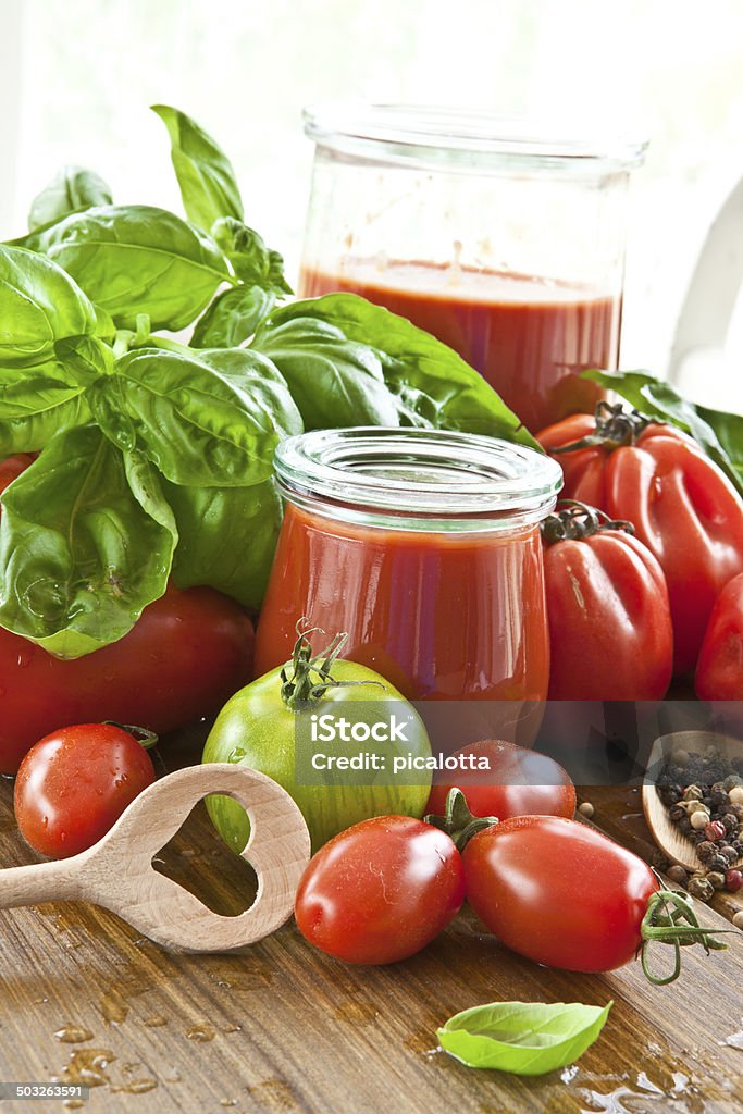 Homemade tomato sauce Homemade tomato sauce made from fresh tomatoes and basil Basil Stock Photo