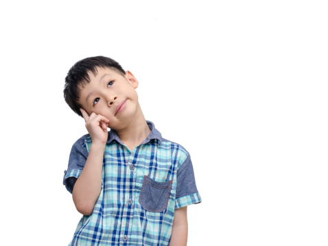 Young Asian boy thinking isolated on white background