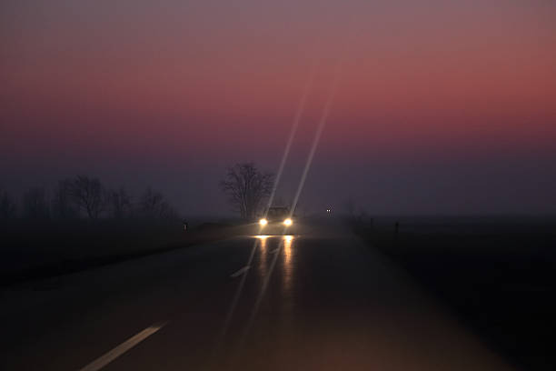 istock Car on the night road at the sunset 503266516