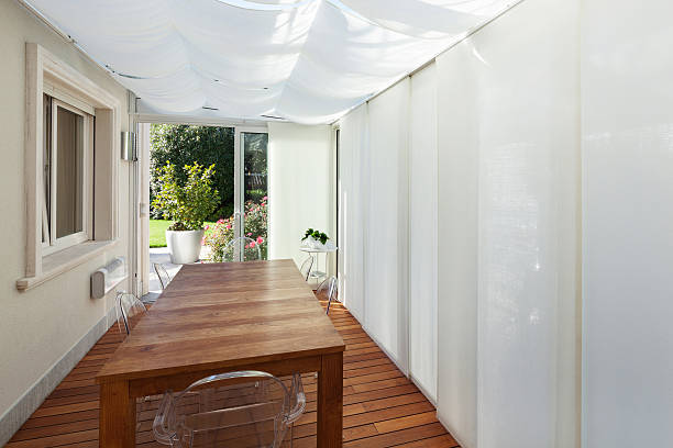 istock House, veranda with wooden table 503267432