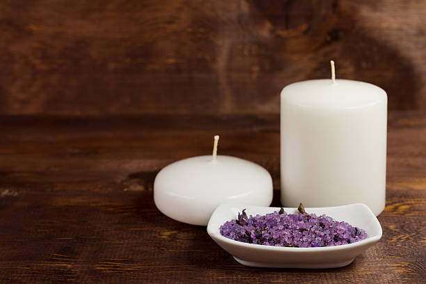 istock White candles and lavender salt spa 503269500