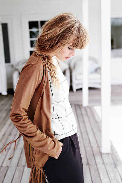 istock Young blogger posing on porch 503270600