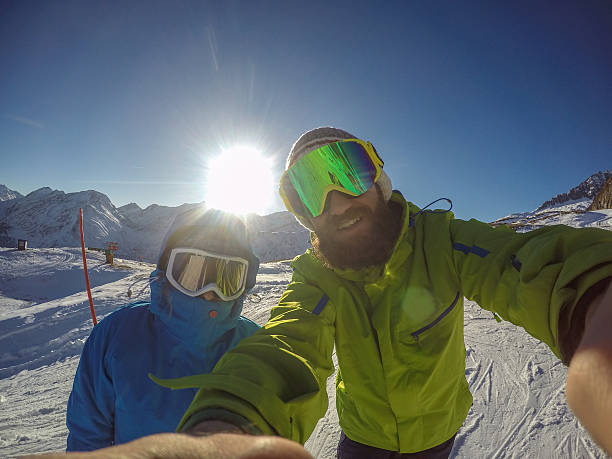 istock Two young adults take selfie portrait on ski slopes 503271690