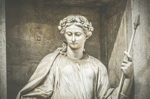 An amazon woman statue at Trevi Fountain, in Rome
